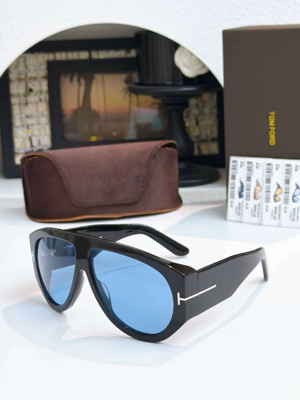 Tom Ford Black Frame Sunglasses with Blue Lenses and Silver T-Logo